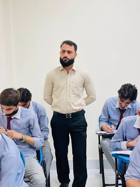Teacher interacting with students